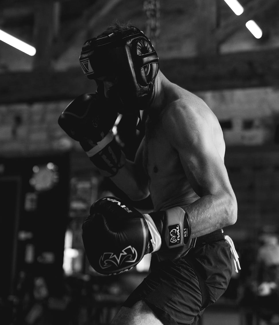 teenage girl with boxing gloves preparing to train